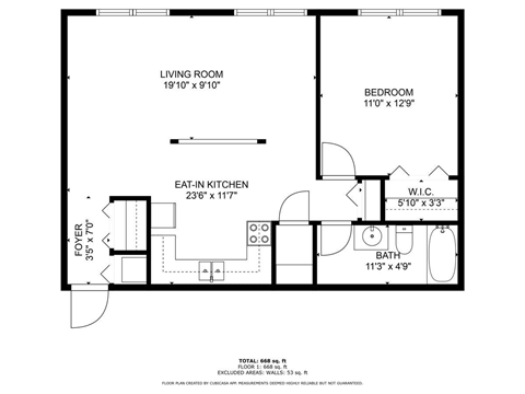 A floor plan of a small apartment with a living room, bedroom, eat-in kitchen, and bathroom.